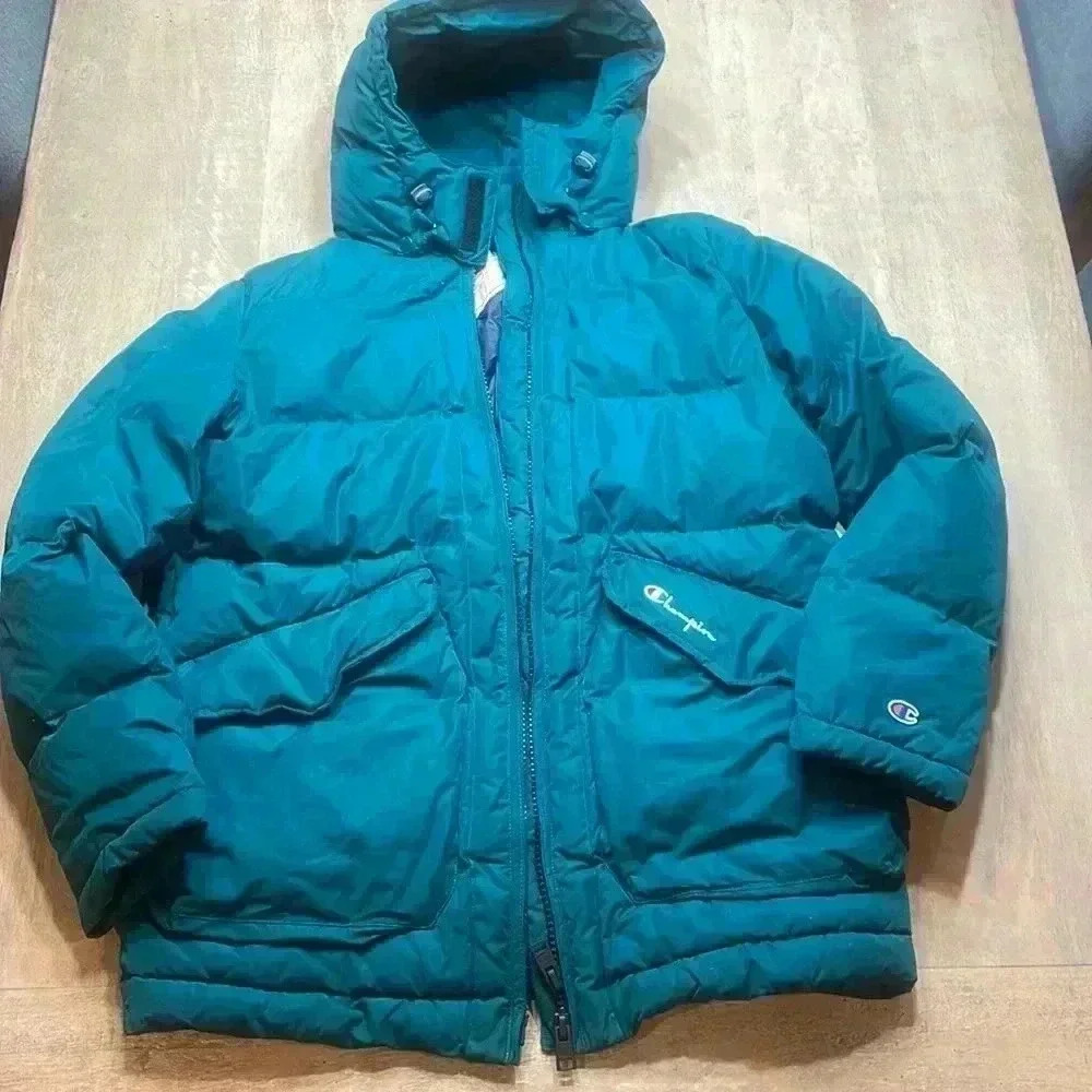 Champion coat, size Medium, Sustans made with DuPont Sorona.  Hunter green color
